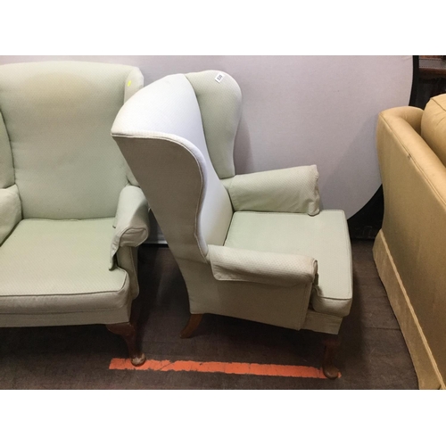 530 - PAIR OF GREEN UPHOLSTERED WINGBACK FIRESIDE CHAIRS ON CABRIOLE LEGS