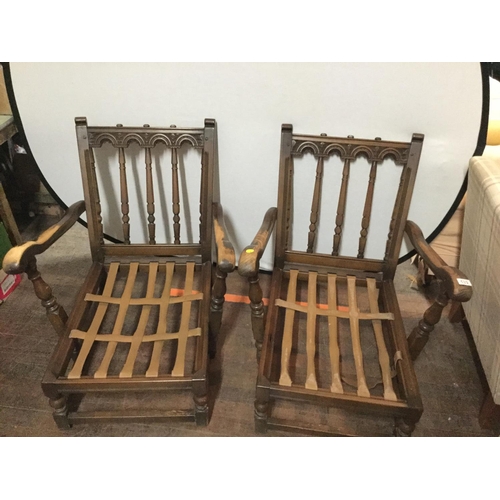 533 - PAIR OF BADGED ERCOL ARMCHAIRS