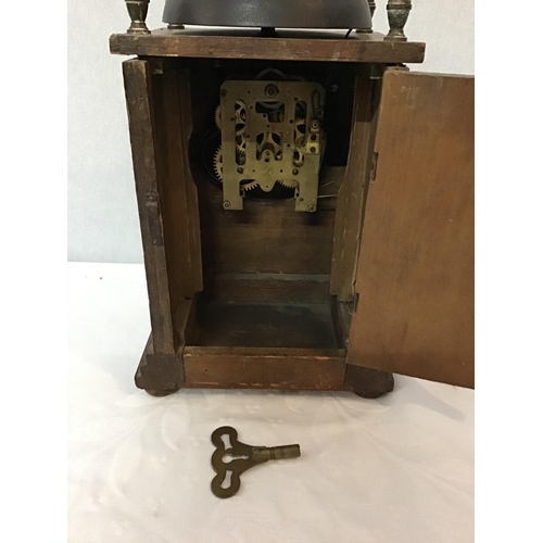 295 - ARTS AND CRAFTS STYLE OAK MANTLE CLOCK WITH BRASS DIAL AND DETAILS