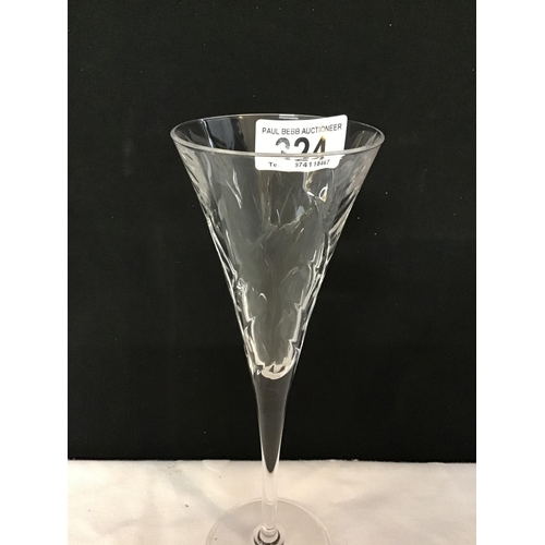 324 - 6 CUT GLASS CHAMPAGNE FLUTES ALONG WITH 5 CHAMPAGNE GLASSES (1 GLASS A/F - CHIP TO RIM)