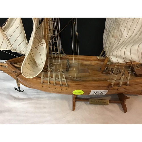 355 - WOODEN MODEL OF A FRENCH SHIP ON STAND TITLED BRICK NEGRIER
H 21