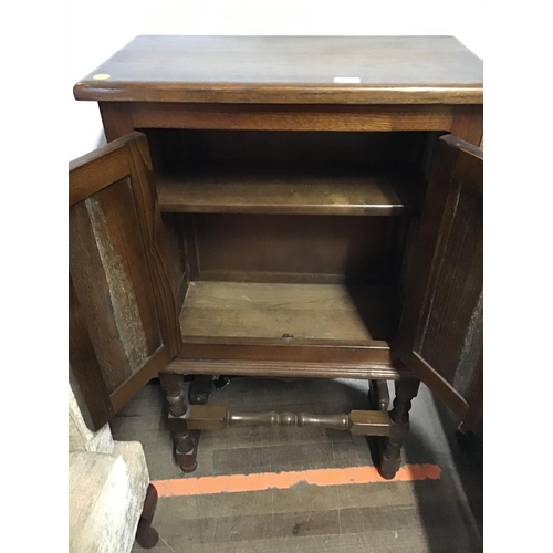 482 - REPRODUCTION STRETCHERED OAK 2 DOOR CABINET 
L 26