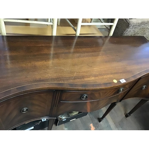 487 - REPRODUCTION MAHOGANY SERPENTINE FRONTED SIDEBOARD
W 22