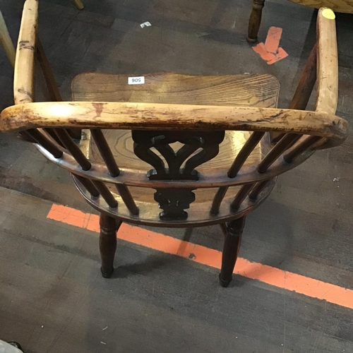 506 - EARLY OAK STRETCHERED FIDDLEBACK ARMCHAIR