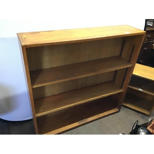 628 - OAK OPEN BOOKCASE AND A SMALL MATCHING CABINET