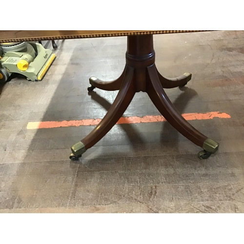 633 - VICTORIAN MAHOGANY  INLAYED DROP LEAF PEDESTAL TABLE ON BRASS CASTORS
L 40