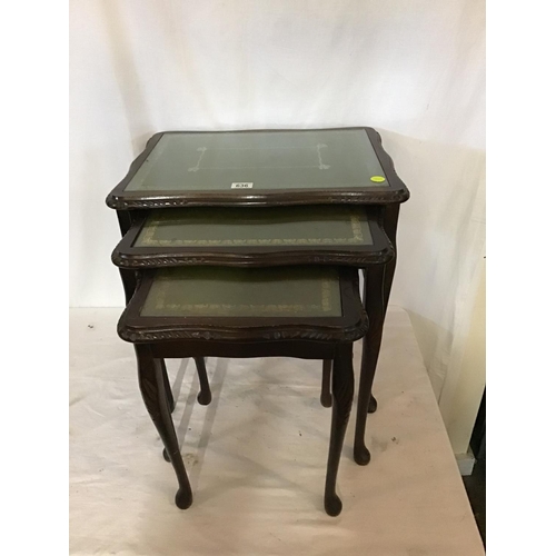 636 - REPRODUCTION  NEST OF TABLES WITH GLASS TOPS AND LEATHER INSETS
L 22