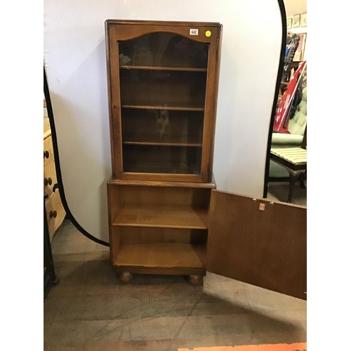 642 - OAK DISPLAY CABINET WITH CUPBOARD TO BASE