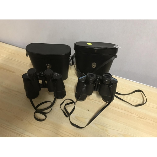 695 - 2 SETS OF BINOCULARS IN CASE
10 X 50