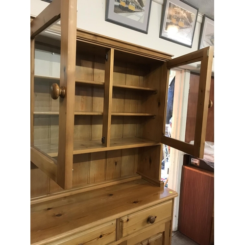 696 - GLAZED PINE KITCHEN DRESSER
H 77