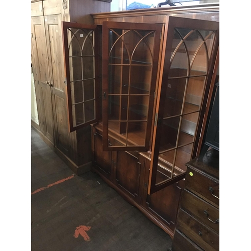 727 - YEW WOOD 3 DOOR GLAZED BOOKCASE
57 X 14