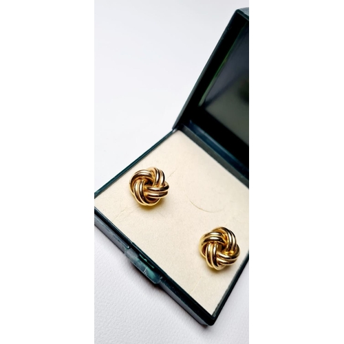 366 - PAIR OF 9CT GOLD EARINGS ON KNOT DESIGN 3.3G