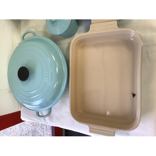 11 - QTY OF BLUE LE CREUSET COOKWARE, TABLE WARE AND STORAGE JARS