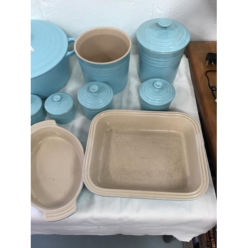 11 - QTY OF BLUE LE CREUSET COOKWARE, TABLE WARE AND STORAGE JARS