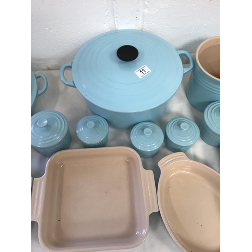 11 - QTY OF BLUE LE CREUSET COOKWARE, TABLE WARE AND STORAGE JARS