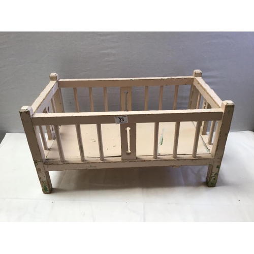 33 - PAINTED PINE CHILDS DOLLS COT