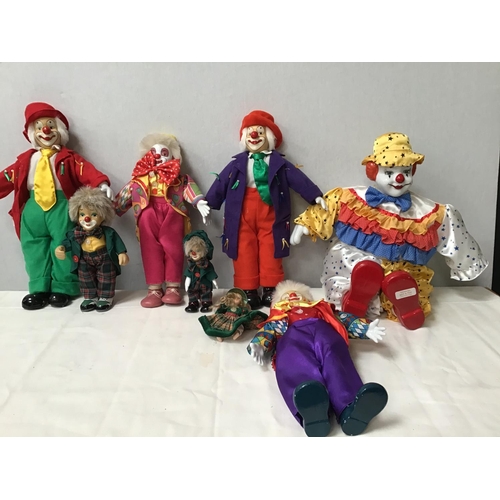 59 - BOX OF CHINA HEADED CLOWNS ETC