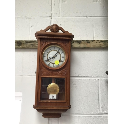 14 - MODERN OAK WALL CLOCK C/W KEY
