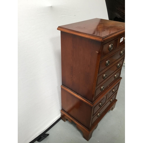 195 - REPRODUCTION YEW WOOD CHEST ON CHEST OF SMALL PROPORTIONS
32