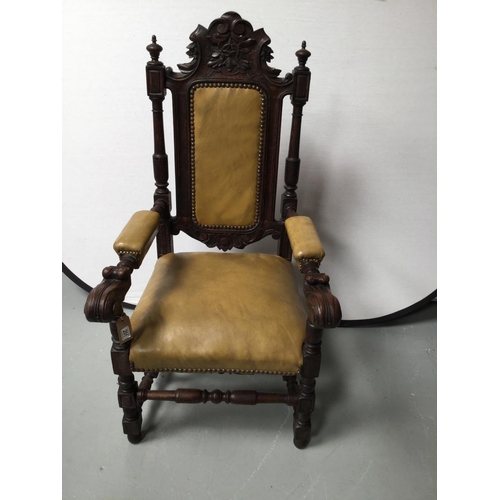 201 - HEAVILY CARVED OAK ARMCHAIR