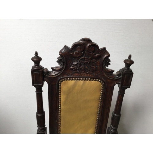 201 - HEAVILY CARVED OAK ARMCHAIR