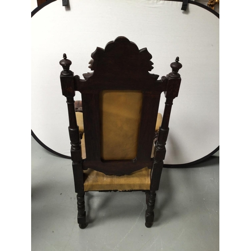 201 - HEAVILY CARVED OAK ARMCHAIR