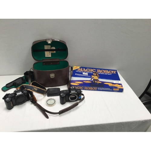 220 - 2 X NIKKON CAMERA'S IN CASE & MAGIC ROBOT GAME