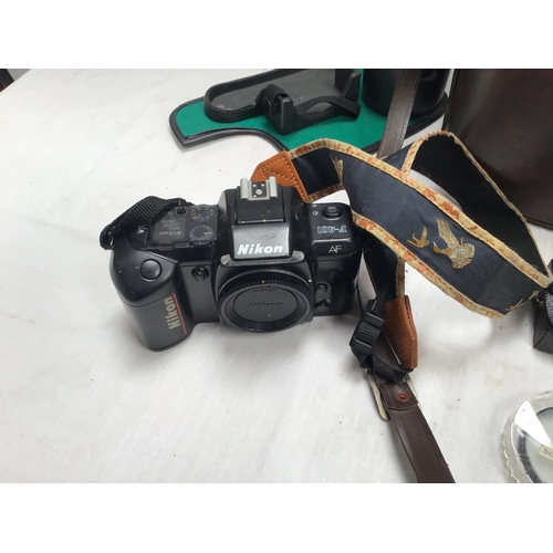220 - 2 X NIKKON CAMERA'S IN CASE & MAGIC ROBOT GAME