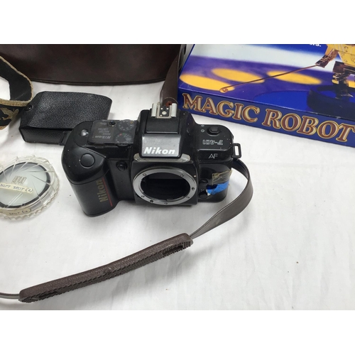 220 - 2 X NIKKON CAMERA'S IN CASE & MAGIC ROBOT GAME