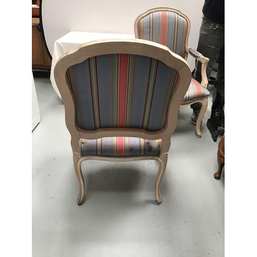 223 - PAIR OF UPHOLSTERED BEDROOM ARMCHAIRS IN NEED OF RESTORATION