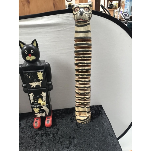 64 - 3 WOODEN CAT ITEMS AND A DIDGERIDOO