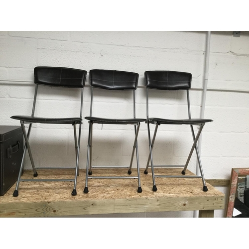 118 - FAUX  LEATHER BOX AND 3 MATCHING FOLDING CHAIRS