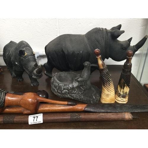 77 - QTY OF CARVED ANIMAL FIGURES, SPEARS, ETC