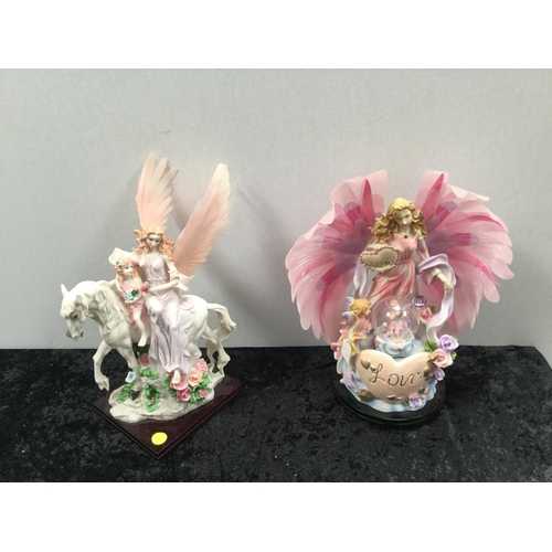 97 - PAIR OF MODERN FAIRY ORNAMENTS