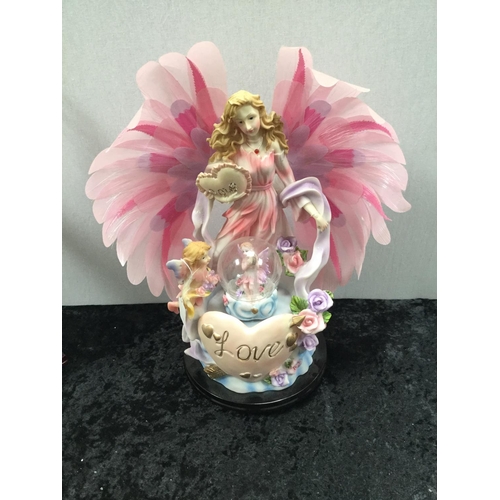 97 - PAIR OF MODERN FAIRY ORNAMENTS