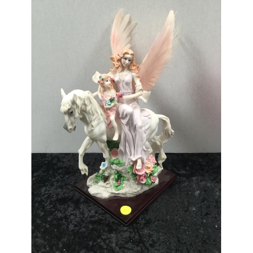 97 - PAIR OF MODERN FAIRY ORNAMENTS
