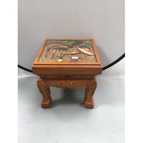 209 - MODERN CHINESE STYLE CARVED TABLE WITH GLASS FITTED TOP