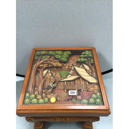 209 - MODERN CHINESE STYLE CARVED TABLE WITH GLASS FITTED TOP