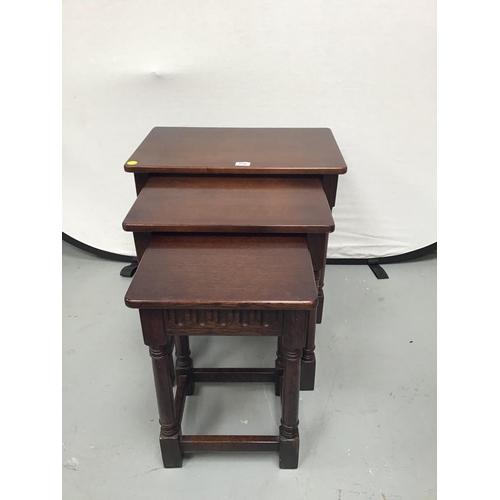 216 - DARK OAK PRIORY STYLE NEST OF 3 TABLES