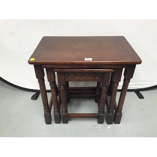 216 - DARK OAK PRIORY STYLE NEST OF 3 TABLES