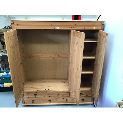223 - PINE TRIPLE WARDROBE WITH 5 DRAWERS TO BASE 
61