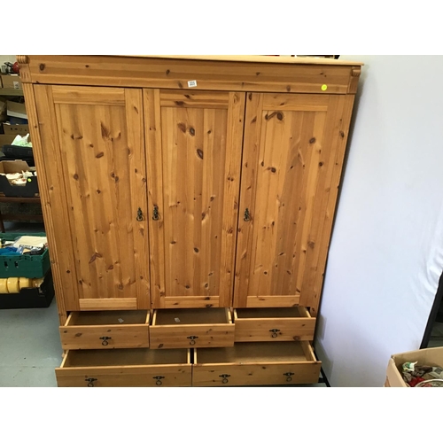 223 - PINE TRIPLE WARDROBE WITH 5 DRAWERS TO BASE 
61
