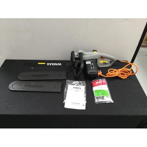 229 - TITAN ELECTRIC CHAINSAW C/W WITH INSTRUCTIONS ETC