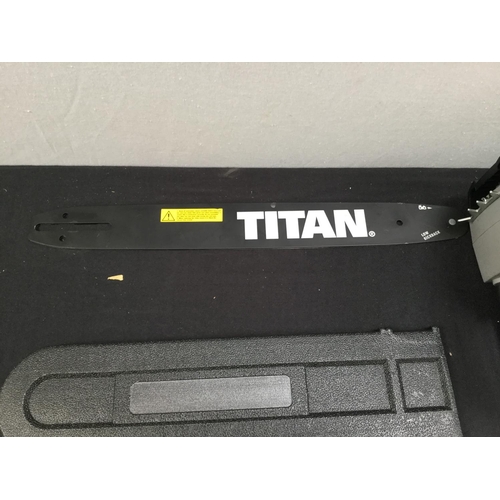 229 - TITAN ELECTRIC CHAINSAW C/W WITH INSTRUCTIONS ETC