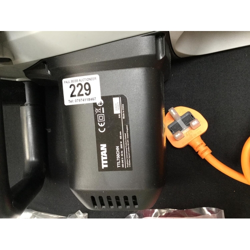 229 - TITAN ELECTRIC CHAINSAW C/W WITH INSTRUCTIONS ETC
