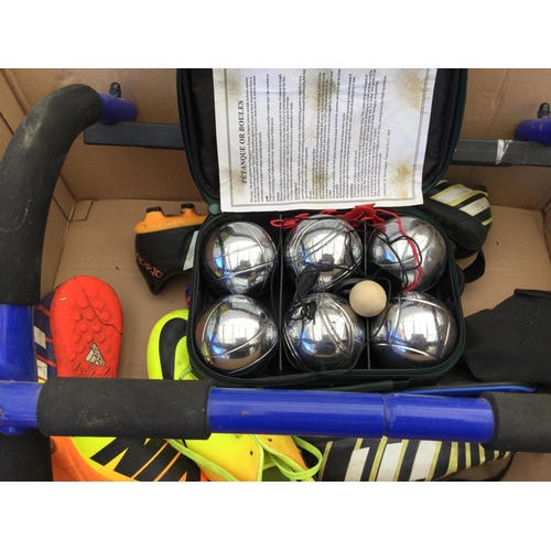 89 - BOX OF FOOTBALL BOOTS, TOY GUITARS, CHILDS SEAT AND BOULES