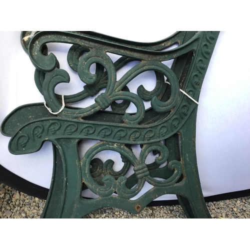 99 - PAIR OF CAST IRON BENCH ENDS