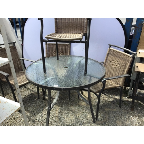 80 - METAL GARDEN TABLE WITH GLASS TOP AND 4 MATCHING GARDEN ARMCHAIRS