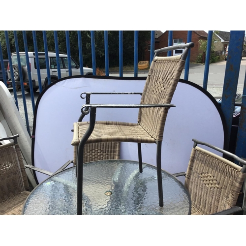 80 - METAL GARDEN TABLE WITH GLASS TOP AND 4 MATCHING GARDEN ARMCHAIRS