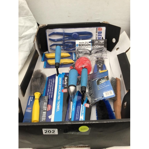 202 - BOX OF NEW TOOLS TO INCLUDE DRILLS, STAPLE GUN, IMPACT SOCKET SET ETC